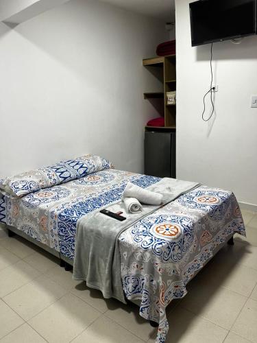מיטה או מיטות בחדר ב-Hostal Albita