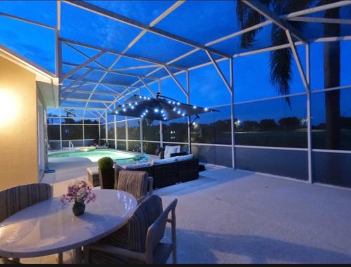 Entire home with pool and lake view and Golf course by Disney photo 5