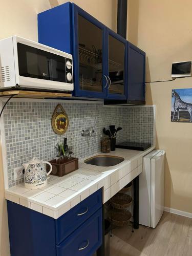 O bucătărie sau chicinetă la Noah Apartment