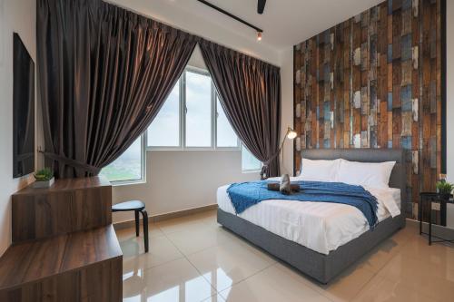 a bedroom with a bed and a large window at Amber Cove Melaka Icon stay in Melaka