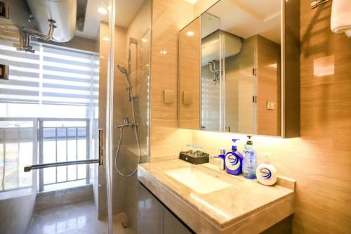 Koupelna v ubytování B T Miele Executive Apartment - Qianhai Square Shenzhen