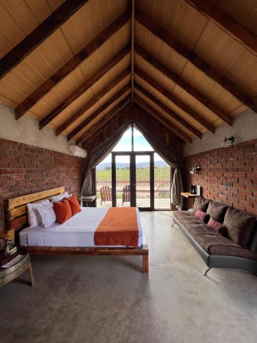 Cama o camas de una habitación en Don Tomas Viñedo cabañas