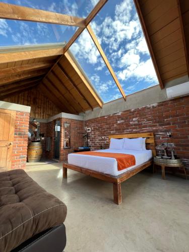 Cama o camas de una habitación en Don Tomas Viñedo cabañas