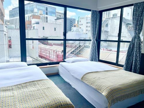 浅草九倶楽部ホテルにあるベッド