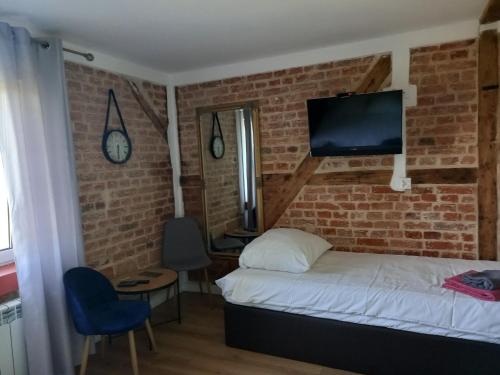 Postel nebo postele na pokoji v ubytování Leon's Rooms