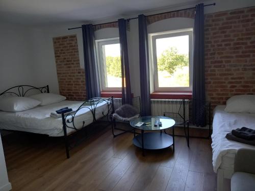 Postel nebo postele na pokoji v ubytování Leon's Rooms