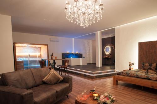 Istumisnurk majutusasutuses Privat-Spa mit Whirlpool und Sauna in Sursee