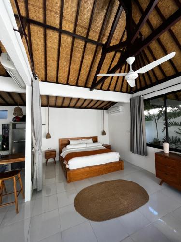 Ένα ή περισσότερα κρεβάτια σε δωμάτιο στο Sol Studios Pererenan