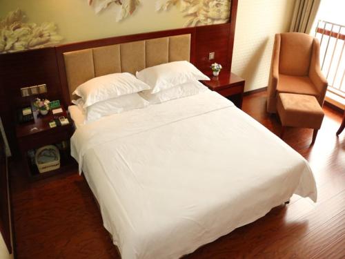 Ένα ή περισσότερα κρεβάτια σε δωμάτιο στο GreenTree Inn Anqing East Yingbin Road High-Speed Railway Station