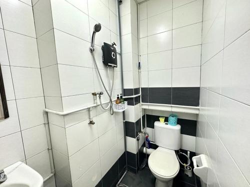 a bathroom with a toilet and a shower at CEO2 Soho Business Suite#Netfix#USM #PISA#Airport#Pantai Hospital in Bayan Lepas
