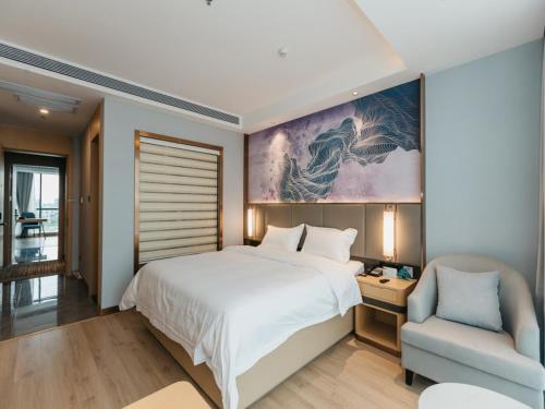 Katil atau katil-katil dalam bilik di GreenTree Inn Jiangsu Yancheng Dongtai Overseas