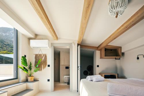 Katil atau katil-katil dalam bilik di Troia Villas