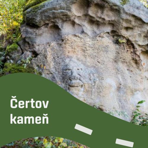 a face on the side of a rock at Vaclavskeho Apartment Medzilaborce in Medzilaborce
