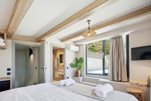 Katil atau katil-katil dalam bilik di Troia Villas