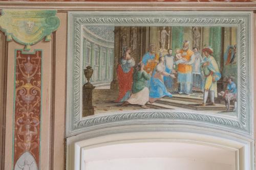 a painting of a group of people in a room at Palazzo Sertorio Suites in Gavi