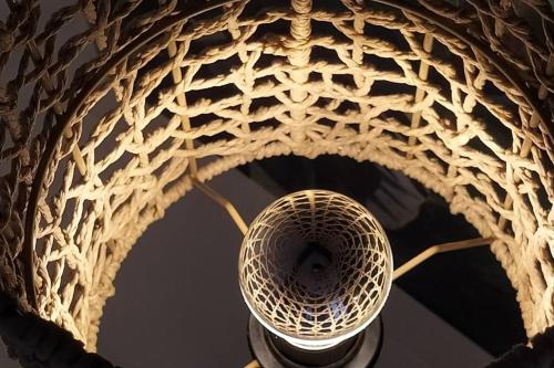 a close up of a light hanging from a ceiling at Ô Bulles de Loire, Châteauneuf-sur-Loire in Châteauneuf-sur-Loire