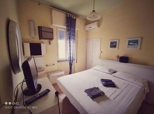 Ein Bett oder Betten in einem Zimmer der Unterkunft Hotel Delhy