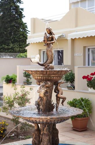 Jardín al aire libre en Hotel Cupidor