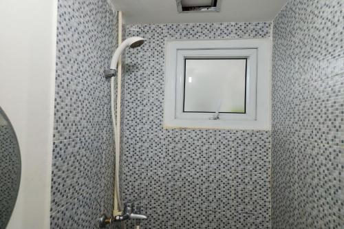 Koupelna v ubytování Barata Hotel Near Bandara Soekarno Hatta