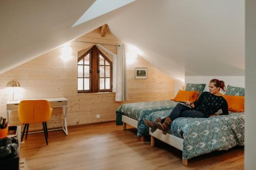 Postel nebo postele na pokoji v ubytování Le Lys Ecossais