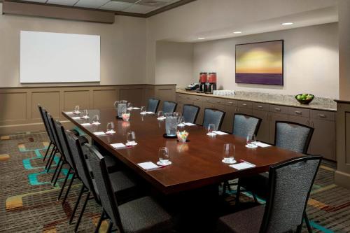 a conference room with a long table and chairs at Residence Inn Houston Downtown/Convention Center in Houston