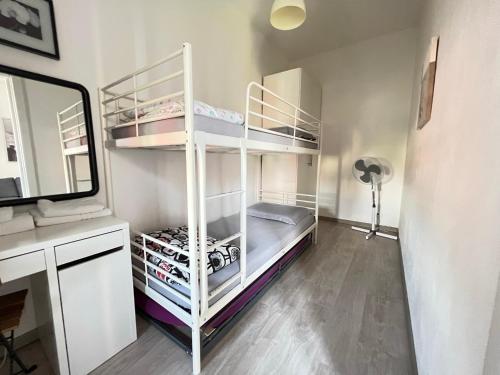 A bed or beds in a room at Celia's Home - Expo Fiera Milano