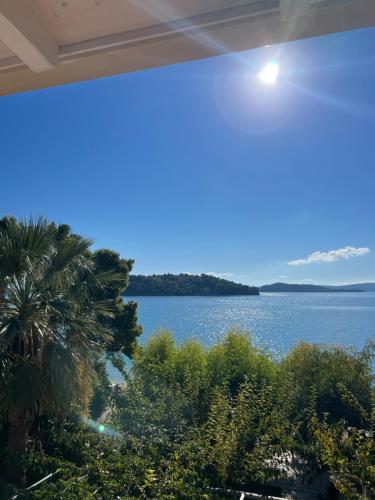 a view of the water from a house at Eva beach hotel in Nydri