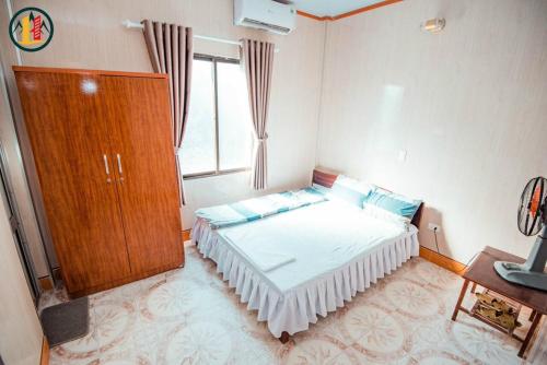 Postelja oz. postelje v sobi nastanitve Hoàng Long Hotel Tam Đảo