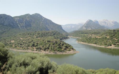 a view of a river with mountains in the background at B&B Bella Vista in Dorgali
