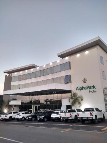 a parking lot in front of an apartment building at AlphaPark Hotel in Goiânia