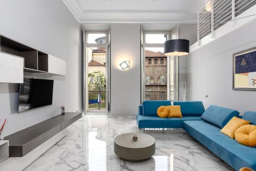 Posezení v ubytování Q71 TIMELESS SUITES