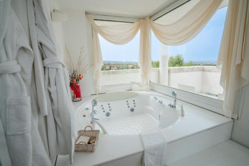 Koupelna v ubytování San Tommaso Hotel