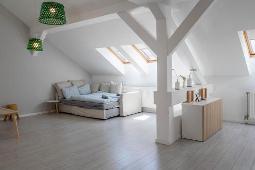 Postel nebo postele na pokoji v ubytování High Light Apartment