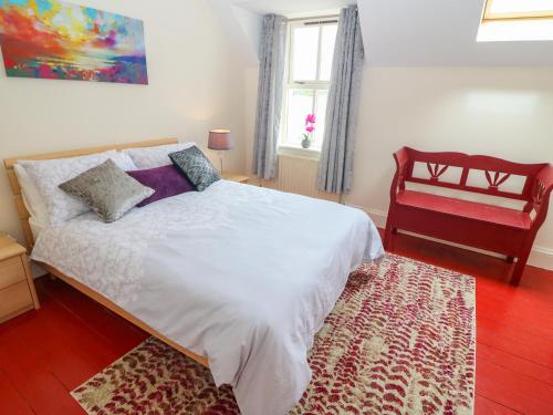 Ένα ή περισσότερα κρεβάτια σε δωμάτιο στο Glasmor Country House