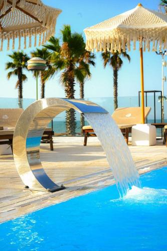 Kolam renang di atau dekat dengan Valerio Resort beach club