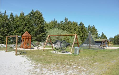 a group of playground equipment on the beach at Stunning Home In Strandby With Wifi in Strandby