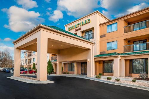 a rendering of a hotel with a parking lot at Courtyard by Marriott Lynchburg in Lynchburg