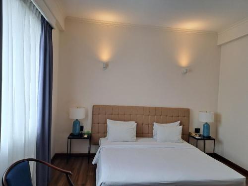Katil atau katil-katil dalam bilik di Liberty 2 Hotel