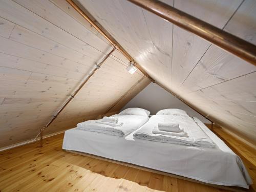 two beds in a small room in a tent at Charming Rooftop Apartment In Heart Of Stavanger in Stavanger