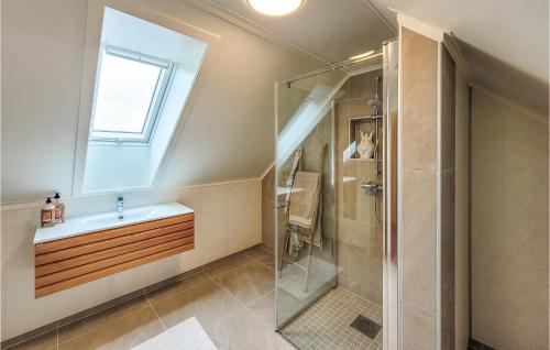 A bathroom at Nice Home In Stolmen With House Sea View