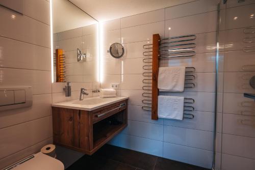 Koupelna v ubytování Hotel Alpenblume