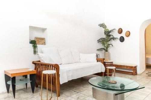 a living room with a couch and a table at The Spanglish Rooftop Garden Modern Historical in Dearing