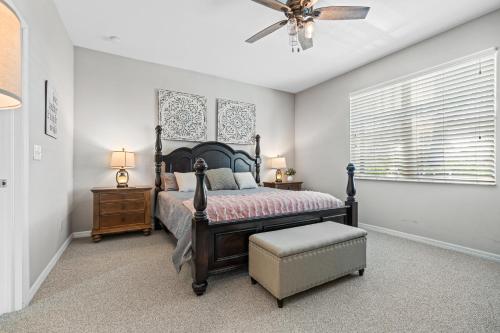 A bed or beds in a room at Beautiful Cape Coral Oasis! King Bed, BBQ, Heated Pool, PVT Yard & Much More!