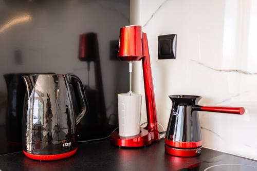 a counter with two coffee makers and a blender at Yin & Yang Studio, Marina Hideout in Kalamata (B3) in Kalamata