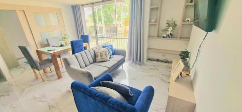 Een zitgedeelte bij Se renta apartamento hermoso amoblado en Ibague sector picaleña