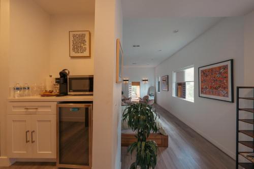 a kitchen with a sink and a counter top at Stunning View Hollywood Hills Guest House in Los Angeles