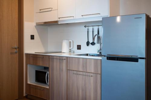 Dapur atau dapur kecil di Квартира с рабочим столом X413 by IBG Property