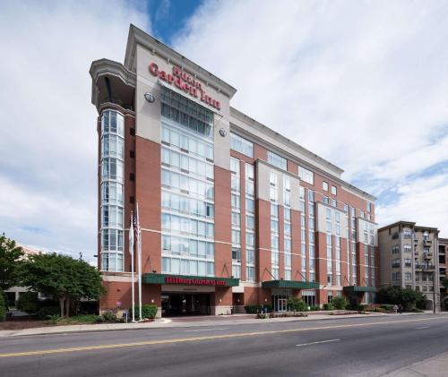 a large building on the corner of a street at Hilton Garden Inn Nashville Vanderbilt in Nashville