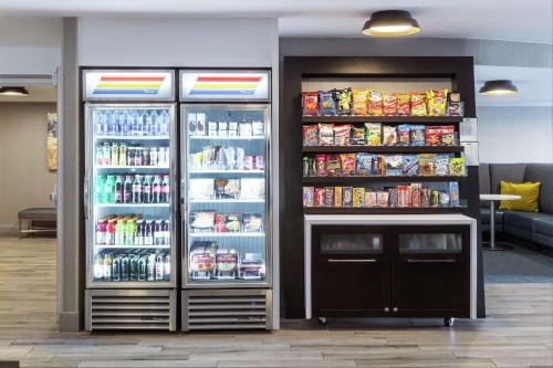 a store with two refrigerators with food and drinks at Hampton Inn Los Angeles Santa Clarita in Santa Clarita