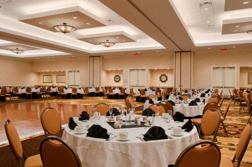 a large banquet hall with tables and chairs at Embassy Suites San Antonio Riverwalk-Downtown in San Antonio